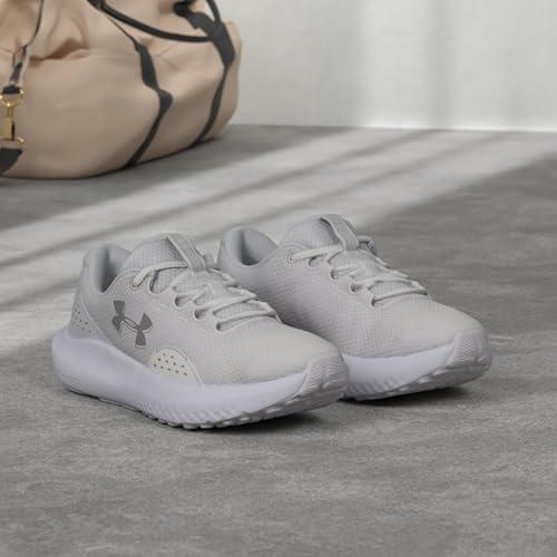 imageUnder Armour Womens Charged Surge 4 Running Shoe100 WhiteDistant GrayMetallic Silver